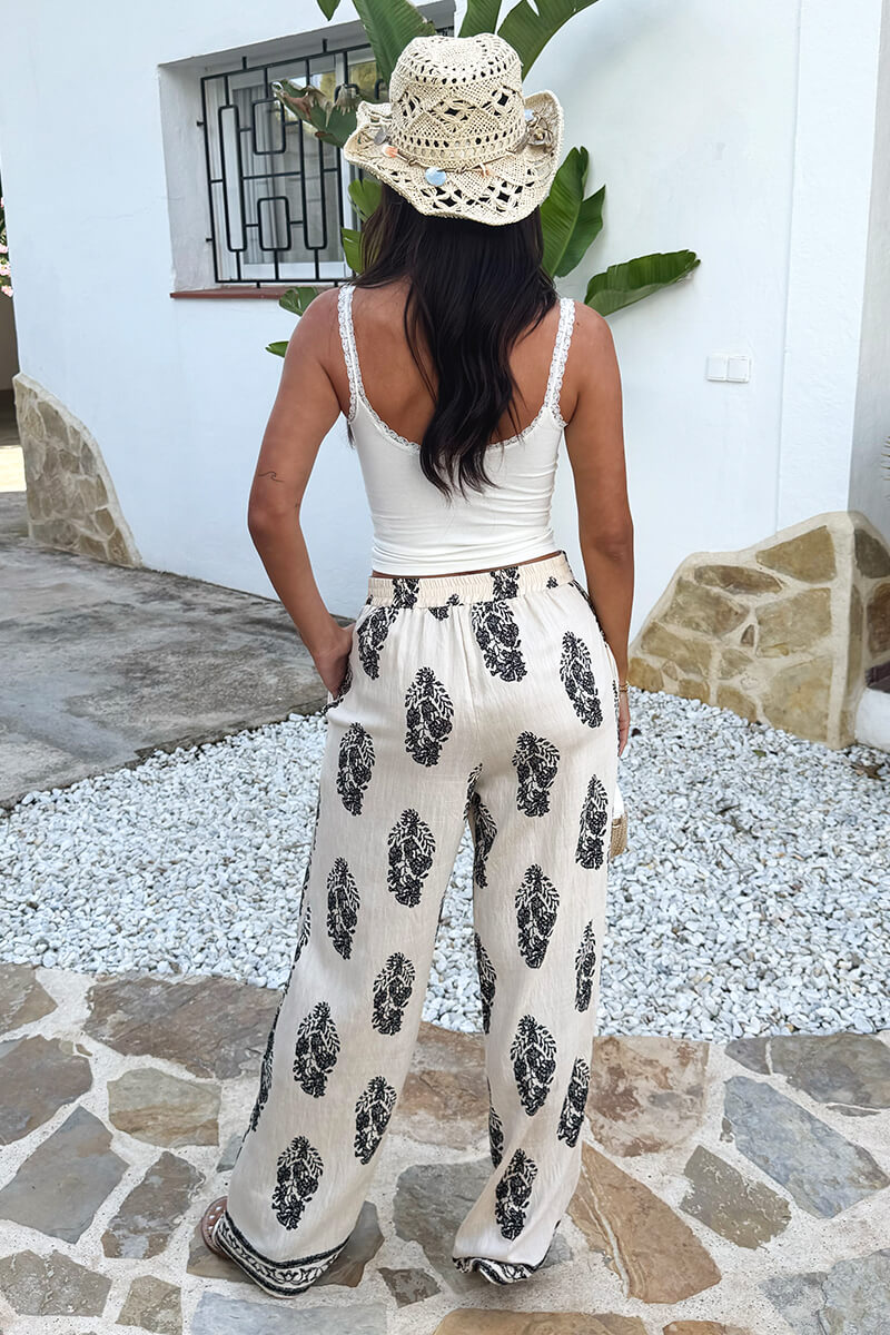 Cream Border Print Wide Leg Trousers